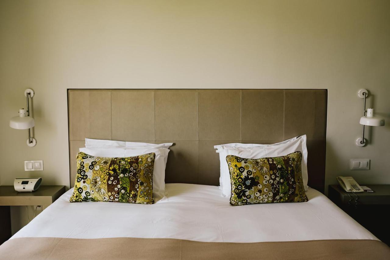 M'Ar De Ar Aqueduto Hotell Évora Eksteriør bilde A bed with a headboard